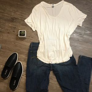 White Luxe flowy curved hem v-neck